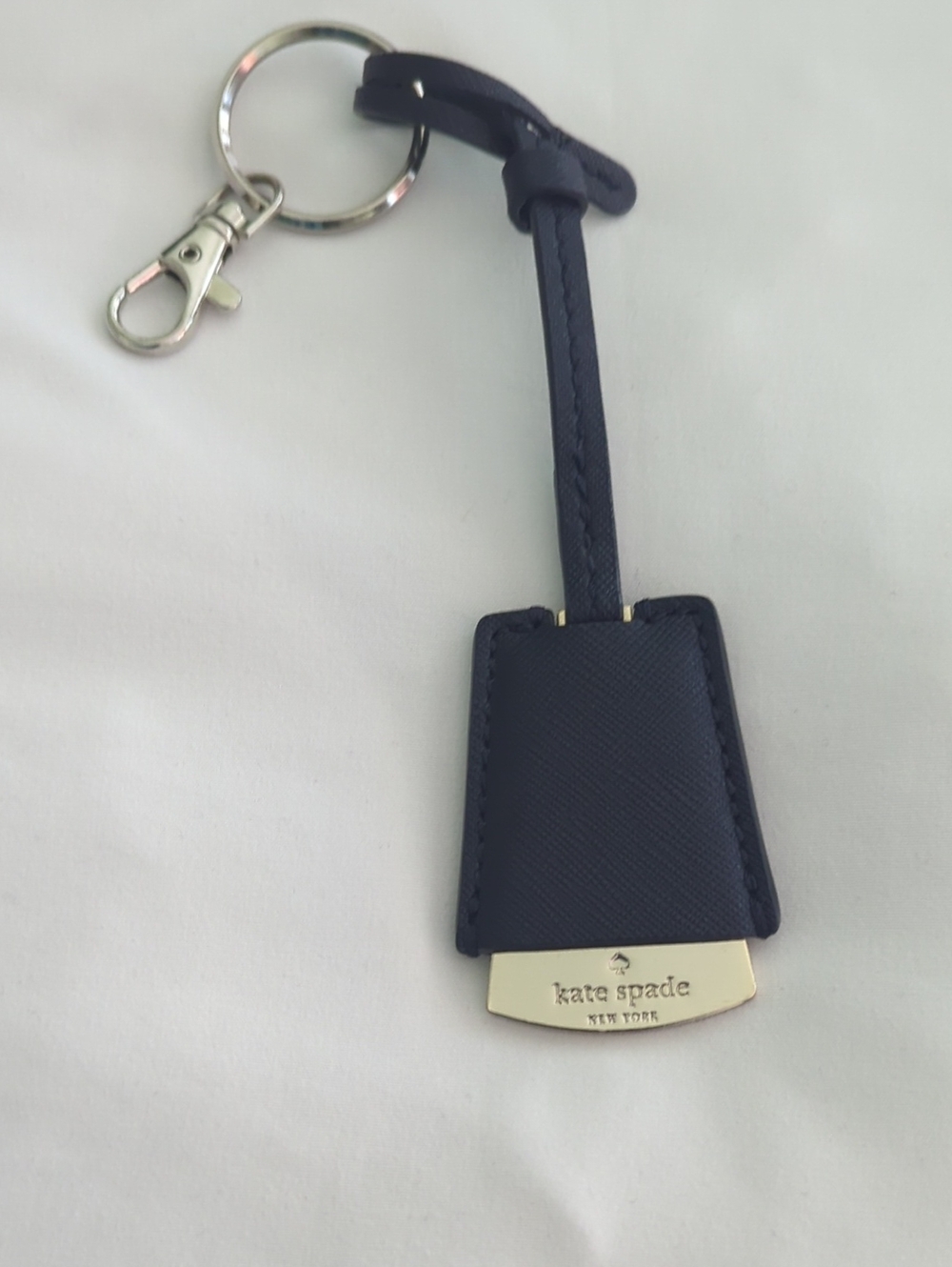 Kate Spade New York navy leather keychain Bag Charm with silver hardware NWOT